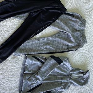 1 grey Nike sweatpants, 1 grey Nike sweatshirt, 1 black Tek gear sweatpants